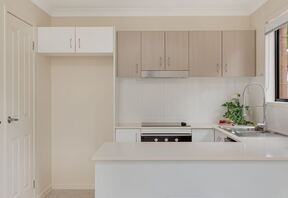 Kitchen and separate internal laundry