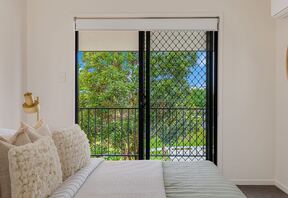Main bedroom with air conditioning and robe