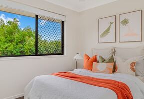 Second bedroom — built in and ceiling fanned