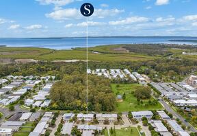 Aerial across Thornlands to Moreton Bay