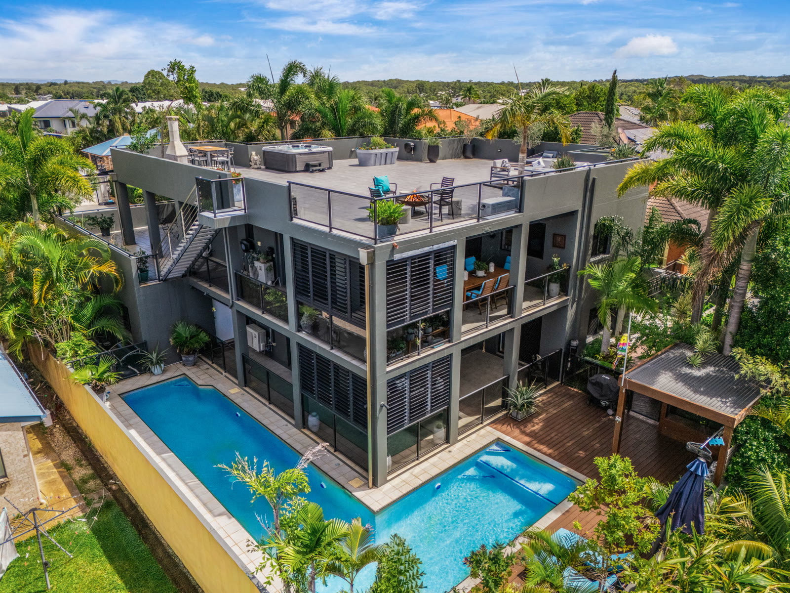 Aerial of home, rooftop and pool