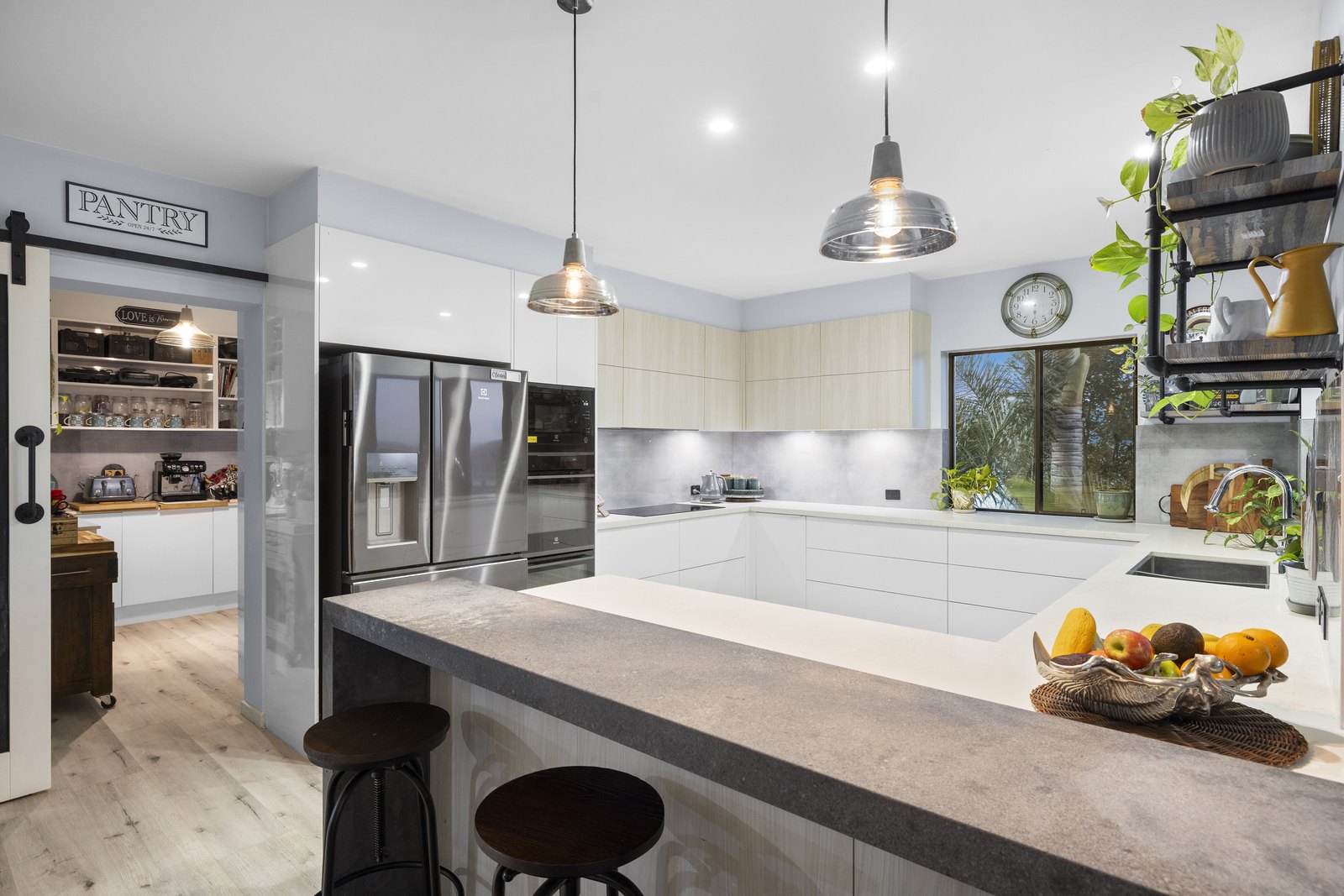 Kitchen — stone benchtops and breakfast bar